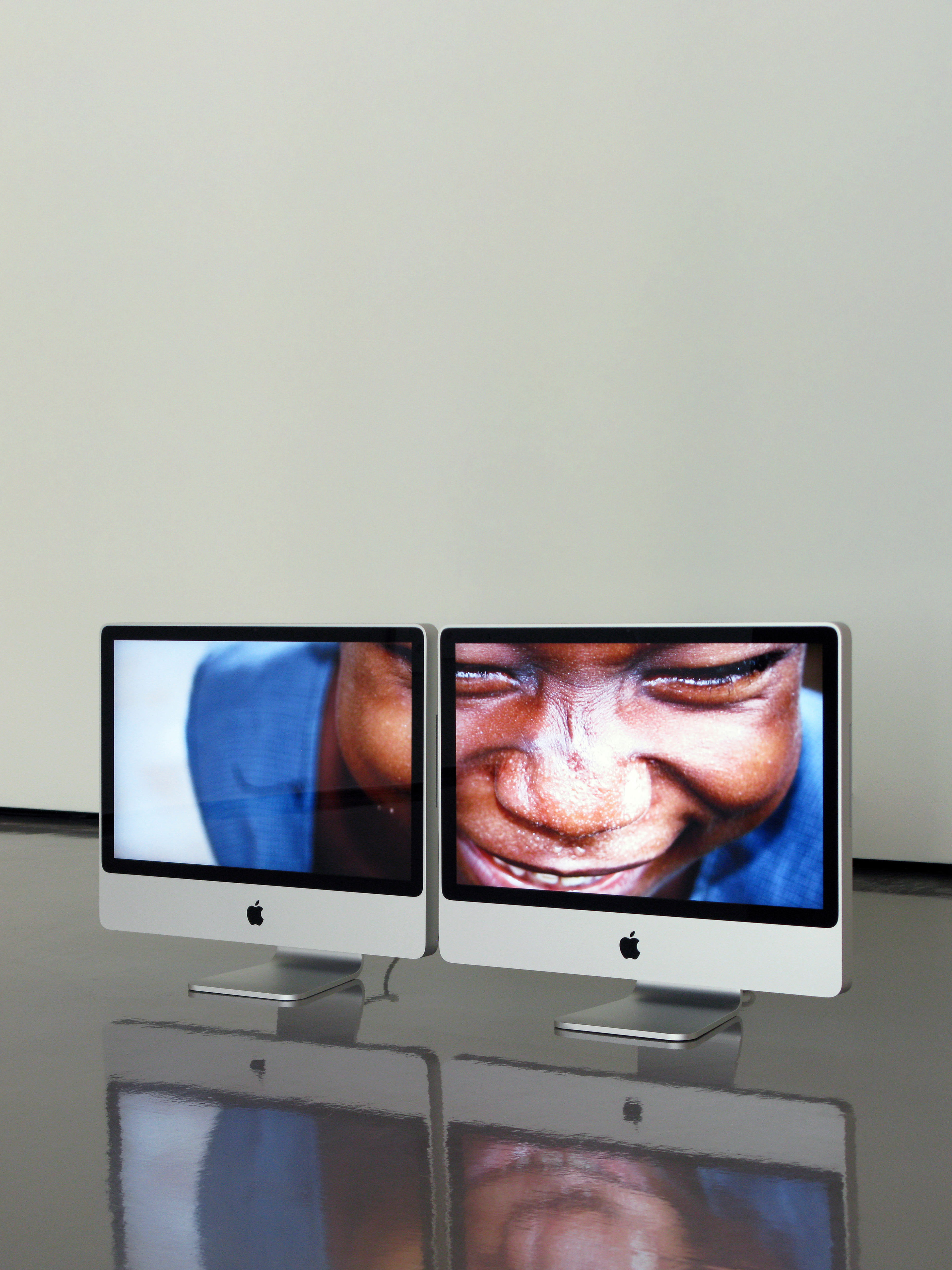 Massimo Grimaldi, EMERGENCY’s Surgical Centre in Goderich, Photos Shown on Two Apple iMac Core 2 Duos, 2008 (Courtesy of the artist and ZERO…, Milan)